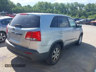 2013 Kia Sorento LX with VIN 5XYKT3A13DG408551, listed as a IAAI auction lot 42648422 with 126,985 mi miles and . Bid and sale history available at DreamBid. Image 4.