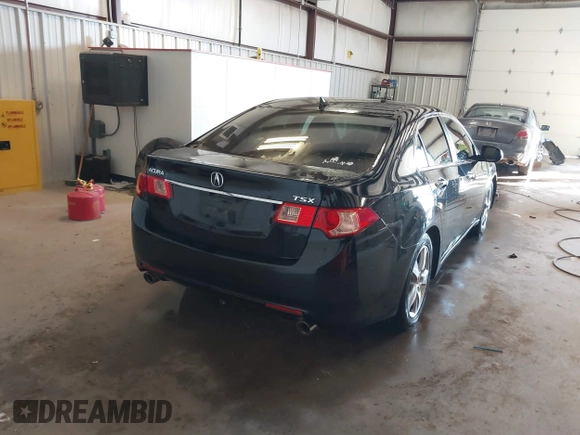 2014 Acura TSX with VIN JH4CU2F42EC005762, listed as a IAAI auction lot 41318591 with 142,934 mi miles and . Bid and sale history available at DreamBid. Image 4.