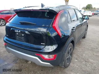 2023 Kia Niro EX with VIN KNDCR3LE7P5050595, listed as a IAAI auction lot 41562442 with 57,408 mi miles. Bid and sale history available at carsss.com. Image 4.