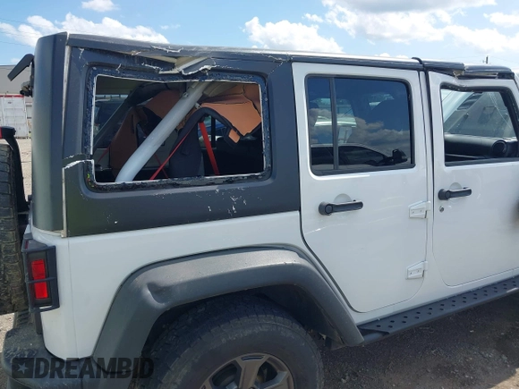 2017 Jeep Wrangler Unlimited Rubicon Recon with VIN 1C4BJWFG1HL693572, listed as a IAAI auction lot 42601855 with 64,342 mi miles and . Bid and sale history available at DreamBid. Image 6.
