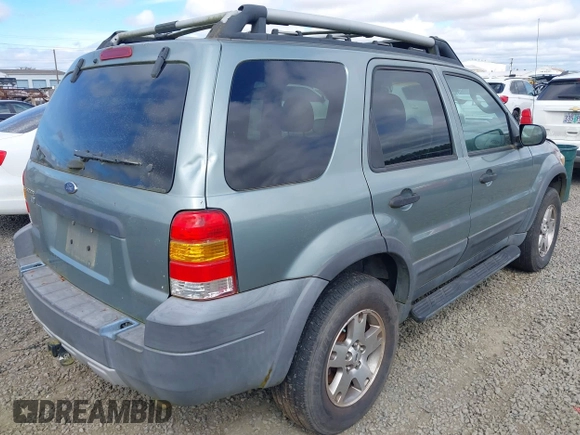 2005 Ford Escape XLT z VIN 1FMYU931X5KA69477, wystawiony jako IAAI lot #42576724 z przebiegiem 143 747 mil mil oraz . Historia ofert i sprzedaży dostępna na DreamBid. Obrazek 4.