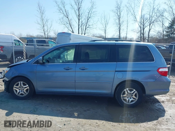 2007 Honda Odyssey EX-L with VIN 5FNRL38727B092077, listed as a IAAI auction lot 41972810 with 211,770 mi miles and . Bid and sale history available at DreamBid. Image 15.