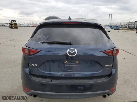 2021 Mazda CX-5 Grand Touring with VIN JM3KFADM8M1321415, listed as a Copart auction lot 47685415 with 90,145 mi miles and Salvage Title. Bid and sale history available at carsss.com. Image 6.
