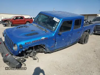2022 Jeep Gladiator Rubicon с VIN 1C6JJTBG4NL151210, выставлен на аукционе Copart как лот 75117154 с пробегом 49 027 миль миль и Списание • Salvage title. История ставок и продаж доступна на DreamBid. Изображение 1.