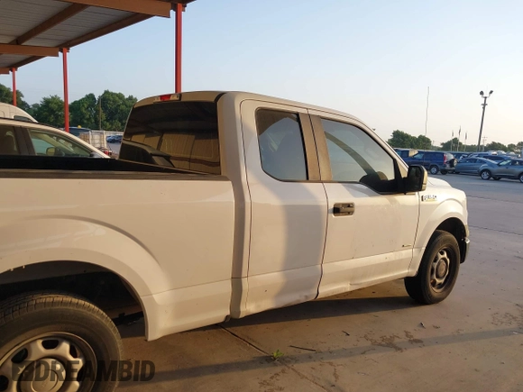 2015 Ford F-150 XL with VIN 1FTEX1CGXFKE20104, listed as a IAAI auction lot 42035347 with 196,674 mi miles. Bid and sale history available at carsss.com. Image 13.