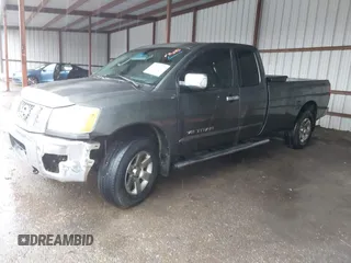 2008 Nissan Titan SE with VIN 1N6BA06F08N332422, listed as a IAAI auction lot 41557137 with 204,735 mi miles and . Bid and sale history available at DreamBid. Image 2.