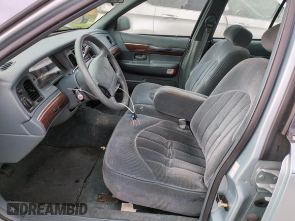 1996 Mercury Grand Marquis GS with VIN 2MELM74W5TX653873, listed as a Copart auction lot 74659254 with 86,589 mi miles and Salvage Title. Bid and sale history available at DreamBid. Image 7.