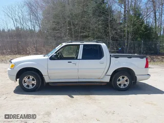 2004 Ford Explorer Sport Trac XLS with VIN 1FMDU77K94UC07938, listed as a IAAI auction lot 42099383 with 232,789 mi miles. Bid and sale history available at carsss.com. Image 12.