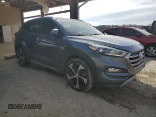 2018 Hyundai Tucson Sport with VIN KM8J33AL0JU802026, listed as a Copart auction lot 45869445 with 124,669 mi miles and Salvage Title. Bid and sale history available at carsss.com. Image 4.