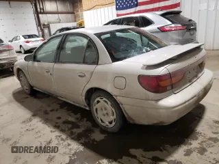 2000 Saturn SL with VIN 1G8ZK5273YZ239987, listed as a Copart auction lot 41577615 with 145,659 mi miles and Salvage title. Bid and sale history available at DreamBid. Image 2.