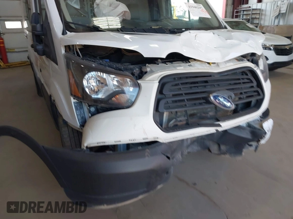 2019 Ford Transit Cargo with VIN 1FTBW3XG4KKA66859, listed as a IAAI auction lot 41940297 with 175,609 mi miles. Bid and sale history available at carsss.com. Image 6.