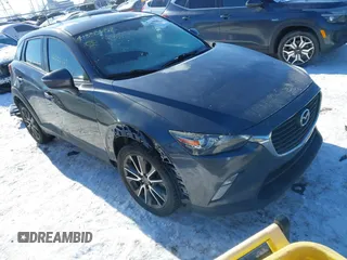 2017 Mazda CX-3 Touring with VIN JM1DKFC72H0167205, listed as a IAAI auction lot 41333632 with 106,063 mi miles. Bid and sale history available at carsss.com. Image 1.