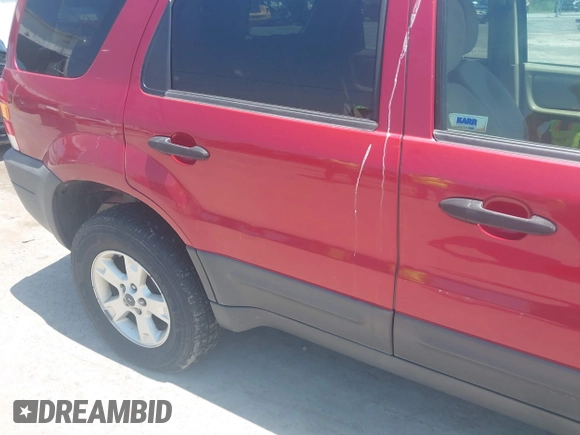 2006 Ford Escape XLT with VIN 1FMCU03156KC06607, listed as a IAAI auction lot 42564636 with 183,896 mi miles and . Bid and sale history available at DreamBid. Image 6.