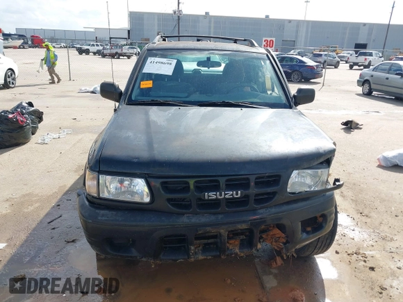 2001 Isuzu Rodeo S with VIN 4S2CK58W114363340, listed as a IAAI auction lot 41498698 with 185,408 mi miles and . Bid and sale history available at DreamBid. Image 12.