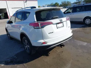 2018 Toyota RAV4 XLE with VIN JTMWFREV8JJ157496, listed as a IAAI auction lot 42249948 with 64,767 mi miles and . Bid and sale history available at DreamBid. Image 3.