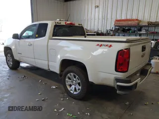 2020 Chevrolet Colorado 4WD LT with VIN 1GCHTCEA3L1189075, listed as a IAAI auction lot 42710899 with 71,439 mi miles and . Bid and sale history available at DreamBid. Image 3.