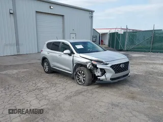 2020 Hyundai Santa Fe SE z VIN 5NMS2CAD3LH147634, wystawiony jako IAAI lot #42157709 z przebiegiem 69 496 mil mil oraz . Historia ofert i sprzedaży dostępna na DreamBid. Obrazek 1.
