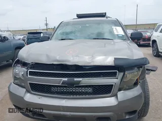 2007 Chevrolet Tahoe LS with VIN 1GNFC13C57R279441, listed as a IAAI auction lot 42428981 with 229,827 mi miles and . Bid and sale history available at DreamBid. Image 13.