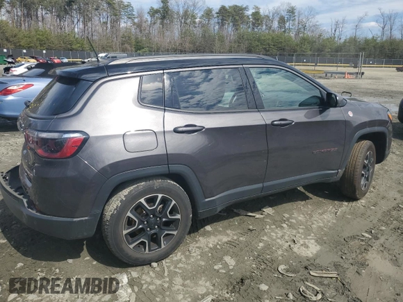 2021 Jeep Compass Trailhawk with VIN 3C4NJDDB7MT602800, listed as a Copart auction lot 50056865 with 68,794 mi miles and Salvage title. Bid and sale history available at DreamBid. Image 3.