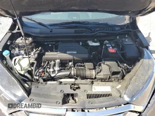 2019 Honda CR-V EX z VIN 7FARW1H5XKE019448, wystawiony jako Copart lot #52162315 z przebiegiem 61 945 mil mil oraz Szkoda całkowita • Salvage title. Historia ofert i sprzedaży dostępna na DreamBid. Obrazek 14.