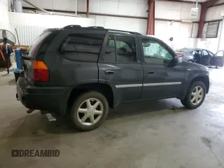 2007 GMC Envoy SLE z VIN 1GKDS13S172279038, wystawiony jako Copart lot #55883635 z przebiegiem 208 794 mil mil oraz Tytuł czysty. Historia ofert i sprzedaży dostępna na DreamBid. Obrazek 3.