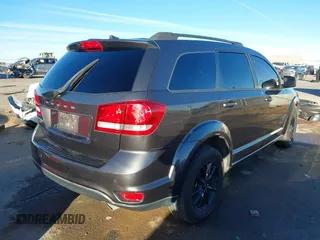 2019 Dodge Journey SE with VIN 3C4PDCBG7KT872888, listed as a IAAI auction lot 41390094 with 114,513 mi miles and . Bid and sale history available at DreamBid. Image 4.