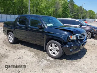 2013 Honda Ridgeline RTL z VIN 5FPYK1F54DB002709, wystawiony jako IAAI lot #42030747 z przebiegiem 118 190 mil mil oraz . Historia ofert i sprzedaży dostępna na DreamBid. Obrazek 1.