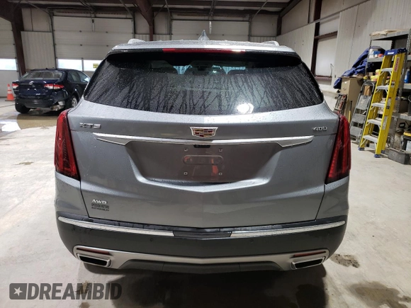2023 Cadillac XT5 AWD Premium Luxury with VIN 1GYKNDRS5PZ221261, listed as a Copart auction lot 52779565 with 7,098 mi miles and Salvage Title. Bid and sale history available at DreamBid. Image 6.