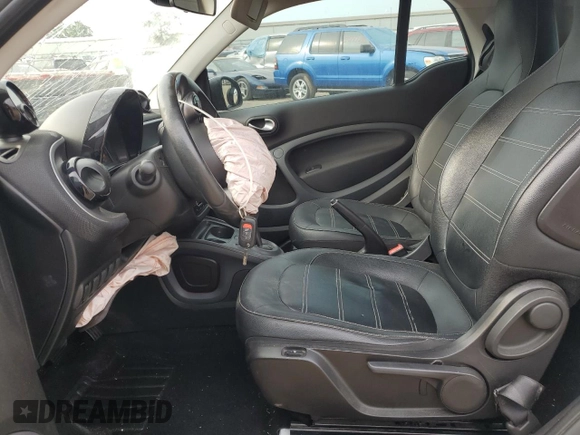 2016 Smart fortwo Passion z VIN WMEFJ5DA9GK062214, wystawiony jako Copart lot #61179715 z przebiegiem 58 152 mil mil oraz Czysty tytuł • Clean title. Historia ofert i sprzedaży dostępna na DreamBid. Obrazek 7.