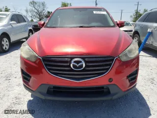 2016 Mazda CX-5 Sport with VIN JM3KE2BY1G0634797, listed as a Copart auction lot 54572155 with 170,164 mi miles and Clean Title. Bid and sale history available at carsss.com. Image 5.