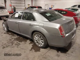 2013 Chrysler 300 with VIN 2C3CCAKT9DH581098, listed as a IAAI auction lot 41411138 with 104,732 mi miles. Bid and sale history available at carsss.com. Image 3.