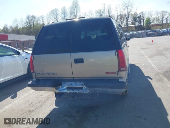 1999 GMC Suburban with VIN 3GKFK16R4XG514928, listed as a IAAI auction lot 41934636 with 245,010 mi miles and . Bid and sale history available at DreamBid. Image 16.