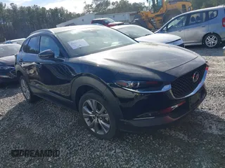 2023 Mazda CX-30 2.5 S Premium Package with VIN 3MVDMBDM7PM528297, listed as a IAAI auction lot 41637542 with 48,935 mi miles. Bid and sale history available at carsss.com. Image 1.