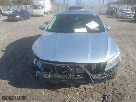 2016 Volkswagen Passat 1.8T SEL with VIN 1VWCT7A35GC011006, listed as a IAAI auction lot 41039744 with 123,422 mi miles. Bid and sale history available at carsss.com. Image 12.
