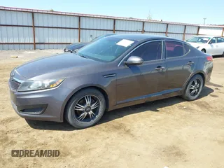 2011 Kia Optima LX with VIN KNAGM4A79B5063381, listed as a IAAI auction lot 42157171 with 175,069 mi miles and . Bid and sale history available at carsss.com. Image 2.