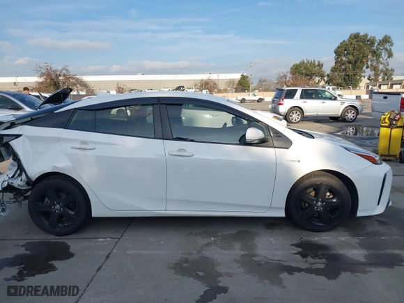 2021 Toyota Prius L Eco with VIN JTDKAMFU9M3131228, listed as a IAAI auction lot 41257117 with 72,840 mi miles. Bid and sale history available at carsss.com. Image 14.