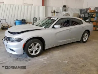 2020 Dodge Charger SXT with VIN 2C3CDXBG6LH111046, listed as a Copart auction lot 62310055 with 78,949 mi miles and Salvage title. Bid and sale history available at DreamBid. Image 1.