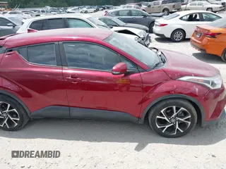 2018 Toyota C-HR XLE with VIN NMTKHMBX6JR054483, listed as a IAAI auction lot 42759739 with 89,820 mi miles and . Bid and sale history available at DreamBid. Image 13.