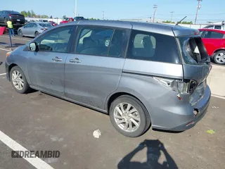2012 Mazda 5 Sport z VIN JM1CW2BL3C0115906, wystawiony jako IAAI lot #42062899 z przebiegiem 124 286 mil mil oraz . Historia ofert i sprzedaży dostępna na DreamBid. Obrazek 3.
