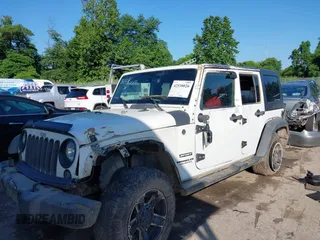 2016 Jeep Wrangler Unlimited Sport z VIN 1C4BJWDG5GL257423, wystawiony jako IAAI lot #42530026 z przebiegiem 157 072 mil mil oraz . Historia ofert i sprzedaży dostępna na DreamBid. Obrazek 6.