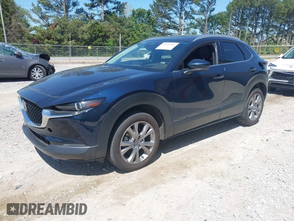 2024 Mazda CX-30 2.5 S Premium Package with VIN 3MVDMBDM7RM654243, listed as a IAAI auction lot 42044783 with 27,936 mi miles. Bid and sale history available at carsss.com. Image 17.