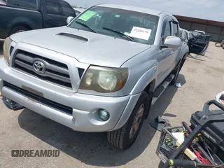 2009 Toyota Tacoma with VIN 3TMLU42N69M032320, listed as a IAAI auction lot 42280196 with 214,720 mi miles and . Bid and sale history available at DreamBid. Image 2.