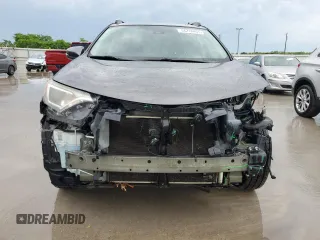 2018 Toyota RAV4 XLE with VIN 2T3WFREV6JW411935, listed as a Copart auction lot 54218405 with 123,831 mi miles and Salvage title. Bid and sale history available at DreamBid. Image 5.