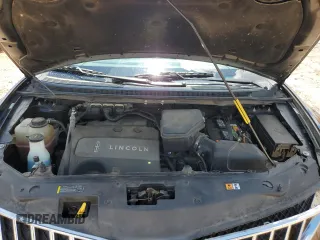 2015 Lincoln MKX z VIN 2LMDJ8JK1FBL31836, wystawiony jako Copart lot #56241005 z przebiegiem 128 613 mil mil oraz Szkoda całkowita • Salvage title. Historia ofert i sprzedaży dostępna na DreamBid. Obrazek 12.