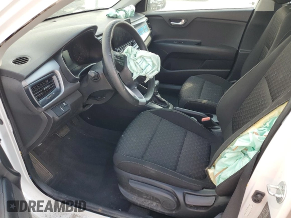 2023 Kia Rio S with VIN 3KPA24AD6PE566205, listed as a Copart auction lot 50621125 with 18,418 mi miles and Salvage Title. Bid and sale history available at carsss.com. Image 7.