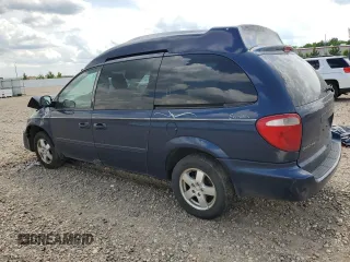 2005 Dodge Caravan SXT with VIN 2D4GP44L95R424704, listed as a Copart auction lot 61243925 with 190,608 mi miles and Salvage title. Bid and sale history available at DreamBid. Image 2.
