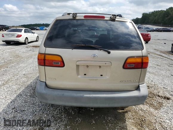 2000 Toyota Sienna LE z VIN 4T3ZF13C7YU259075, wystawiony jako Copart lot #58416105 z przebiegiem 235 788 mil mil oraz Szkoda całkowita • Salvage title. Historia ofert i sprzedaży dostępna na DreamBid. Obrazek 6.