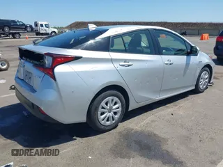 2020 Toyota Prius L Eco with VIN JTDKARFU0L3109212, listed as a IAAI auction lot 42356801 with 81,478 mi miles and . Bid and sale history available at DreamBid. Image 4.