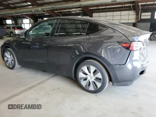 2024 Tesla Model Y Long Range z VIN 7SAYGDEE2RA246928, wystawiony jako Copart lot #60996035 z przebiegiem 19 266 mil mil oraz Szkoda całkowita • Salvage title. Historia ofert i sprzedaży dostępna na DreamBid. Obrazek 2.