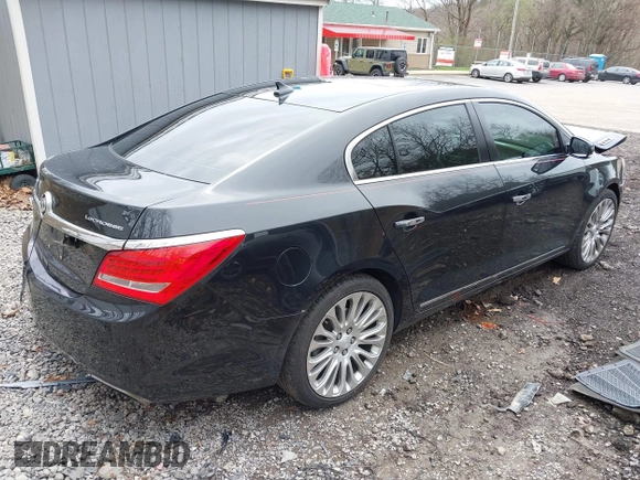 2014 Buick LaCrosse Premium II with VIN 1G4GF5G39EF172201, listed as a IAAI auction lot 41963281 with 106,231 mi miles and . Bid and sale history available at DreamBid. Image 4.